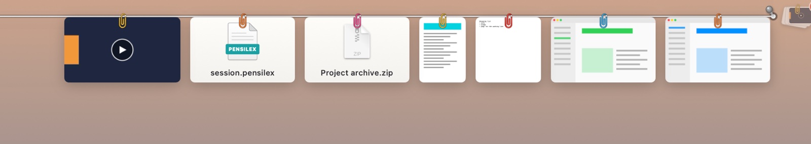 Files hanging on the line: a film with a play button, a document, an archive and screenshots.